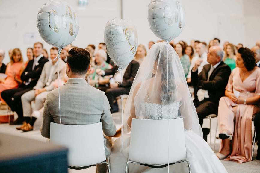 A heartfelt ceremony in a beautifully decorated interior